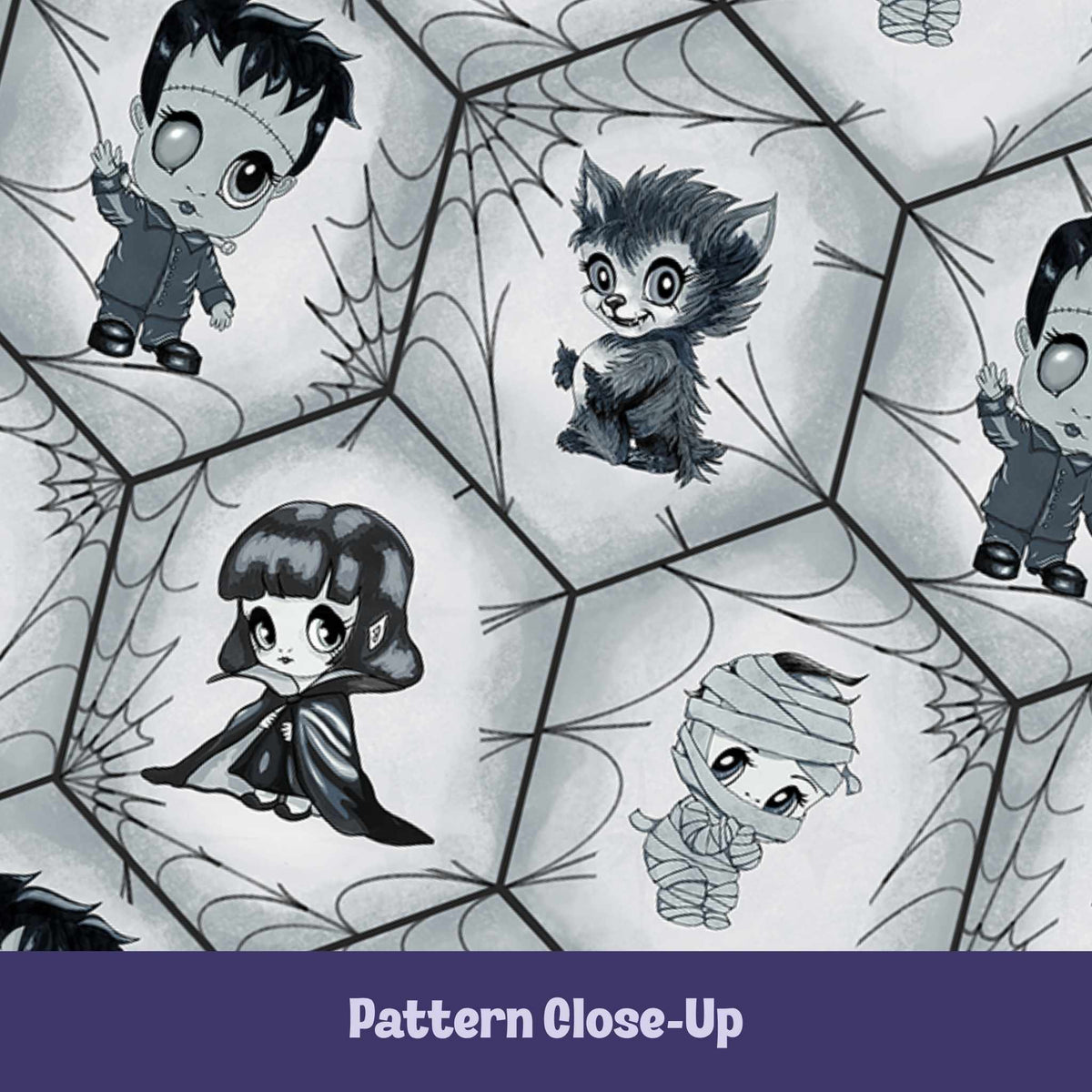 Close-up of the black and white monster pattern showing hand-drawn chibi Frankenstein, werewolf, vampire, and mummy inside interlocking hexagon blocks filled with fine-line spiderwebs