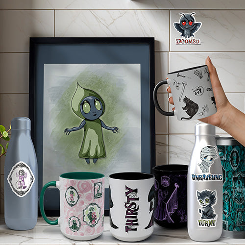 thumbnail of Hand-drawn Halloween collection on a marble counter: zombie mugs, chibi monsters on a water bottle, cryptid stickers, a zombie tumbler, and a framed Flatwoods Monster watercolor art print.