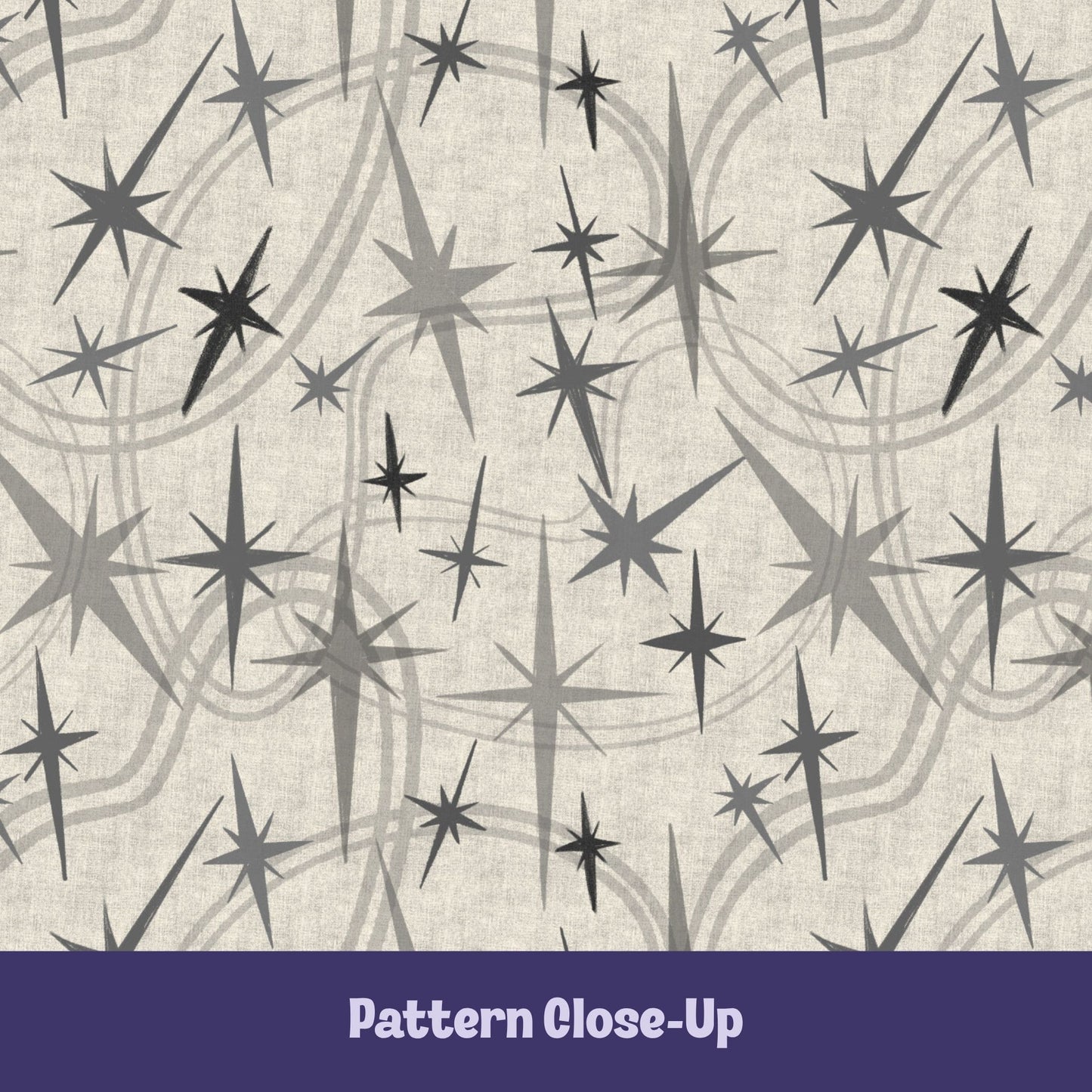 Close-up of the warm gray and charcoal atomic starburst pattern on a natural oatmeal background showing varied starburst sizes and layered concentric swoosh details