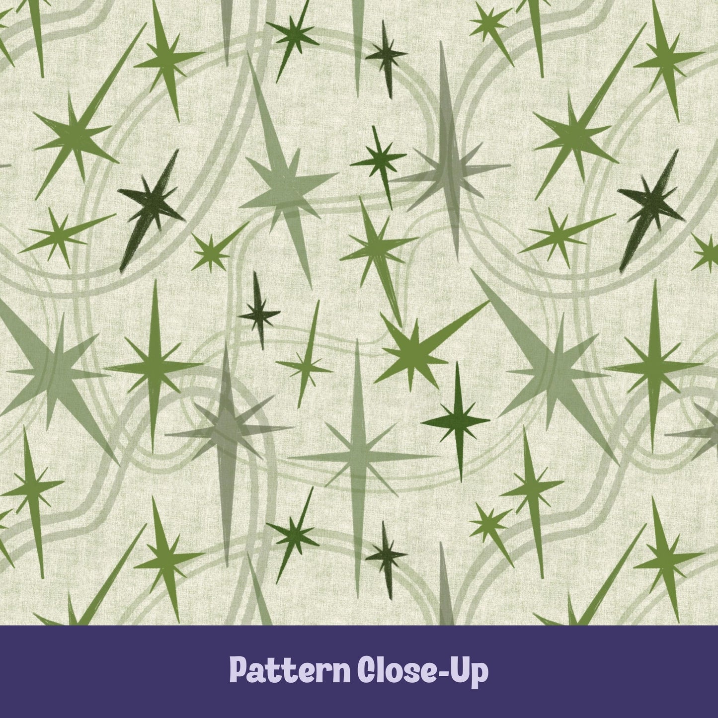 Close-up of the olive and sage green atomic starburst pattern on a warm cream background showing freehand-illustrated starbursts in multiple sizes with sweeping orbit curve details