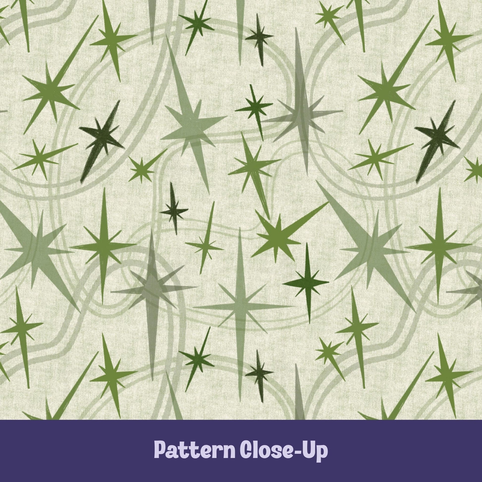 Close-up of the olive and sage green atomic starburst pattern on a warm cream background showing freehand-illustrated starbursts in multiple sizes with sweeping orbit curve details