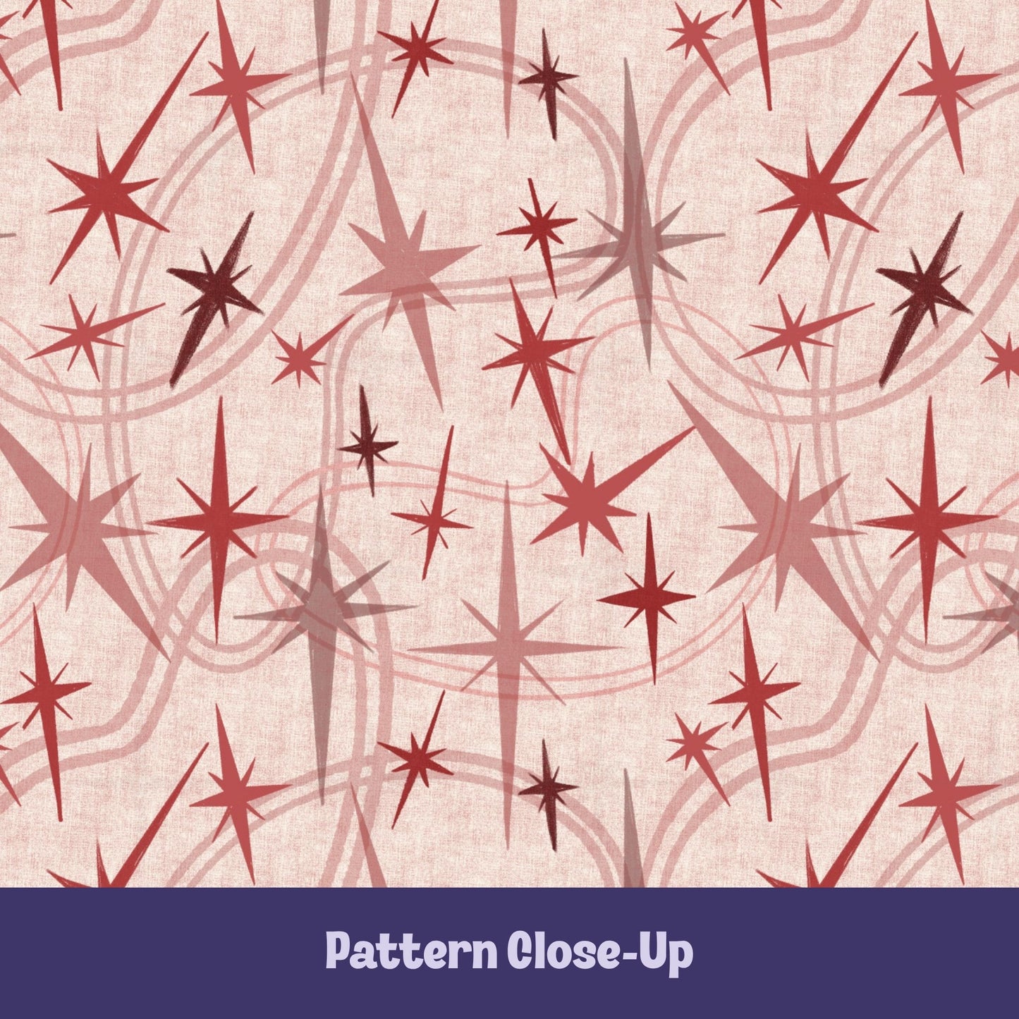 Close-up of the dusty rose and crimson atomic starburst pattern on a blush background, showing freehand-illustrated starburst motifs in varied sizes with concentric orbit curve details