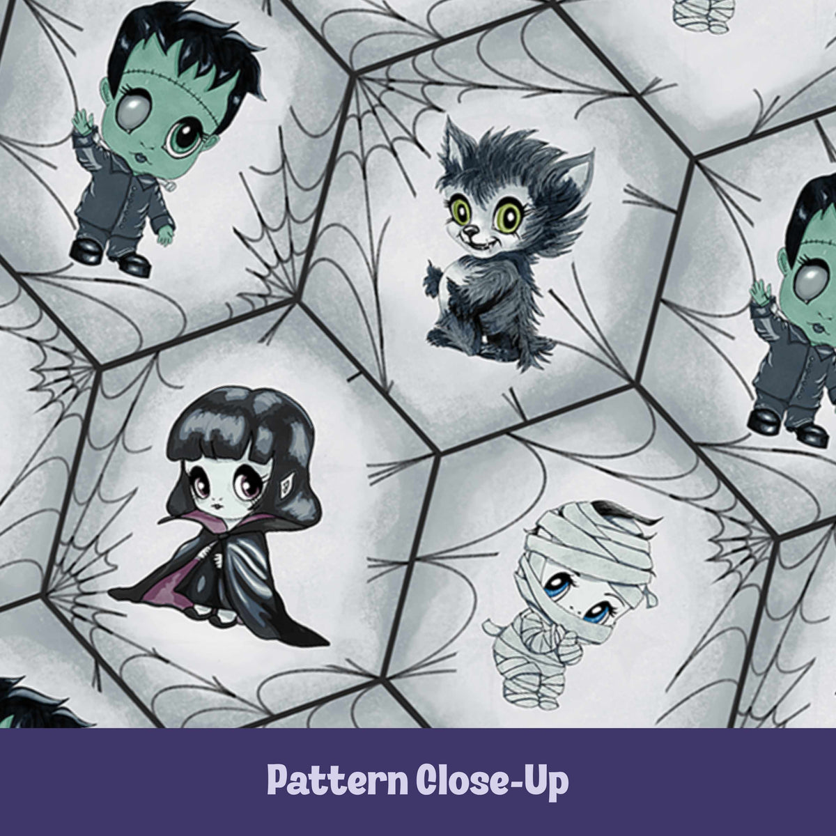 Close-up of the chibi monster pattern showing mint green Frankenstein, chartreuse-eyed werewolf, plum-lined vampire cape, and blue-eyed mummy on a charcoal spiderweb lattice