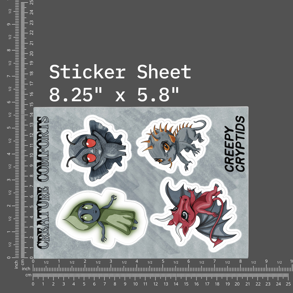 Cryptid sticker sheet shown beside inch and centimeter rulers measuring 8.25 by 5.8 inches