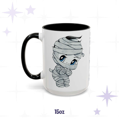 Cute bandaged mummy monster mug in 15 oz, white with black accent handle and rim