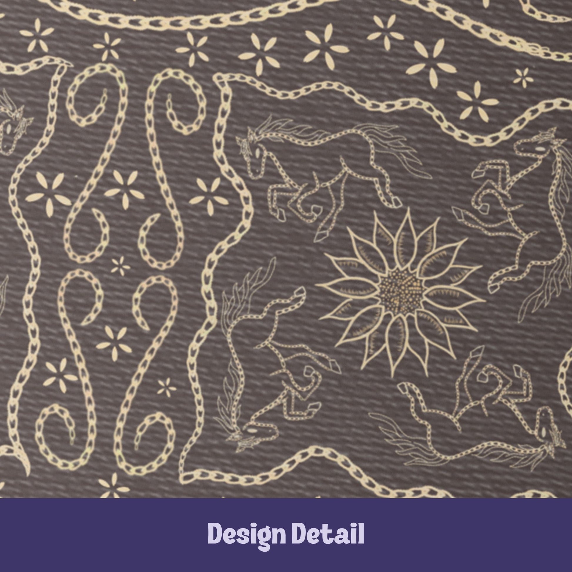 Close-up detail of vintage equestrian embroidered design showing galloping horses, sunburst medallion, and scrolling chain flourishes in cream on dark brown