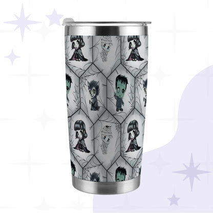 Goth tumbler with chibi vampire girl, mint green Frankenstein, werewolf, and mummy standing in a gray hexagon spiderweb pattern