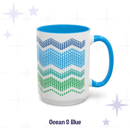 Ocean and Blue 15oz hidden message mug showing the four-band chevron pattern in navy, sky blue, teal, and green with blue handle and blue interior