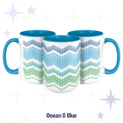 Three Ocean and Blue hidden message mugs from different angles, with the hidden text 'I LOVE MY ASSHOLE KID”' readable in the typographic stitch pattern on the middle mug

