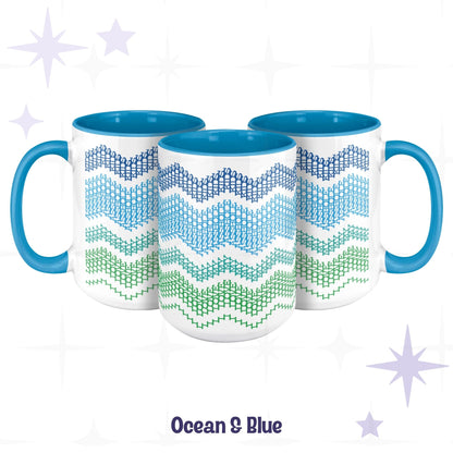Three Ocean & Blue hidden message accent mugs arranged together, wrap-around typographic wave pattern transitioning from navy through teal to green on white ceramic
