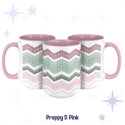 Three Preppy & Pink hidden message accent mugs arranged together, showing the full typographic wave pattern in burgundy, sage, forest green, and pink on white ceramic