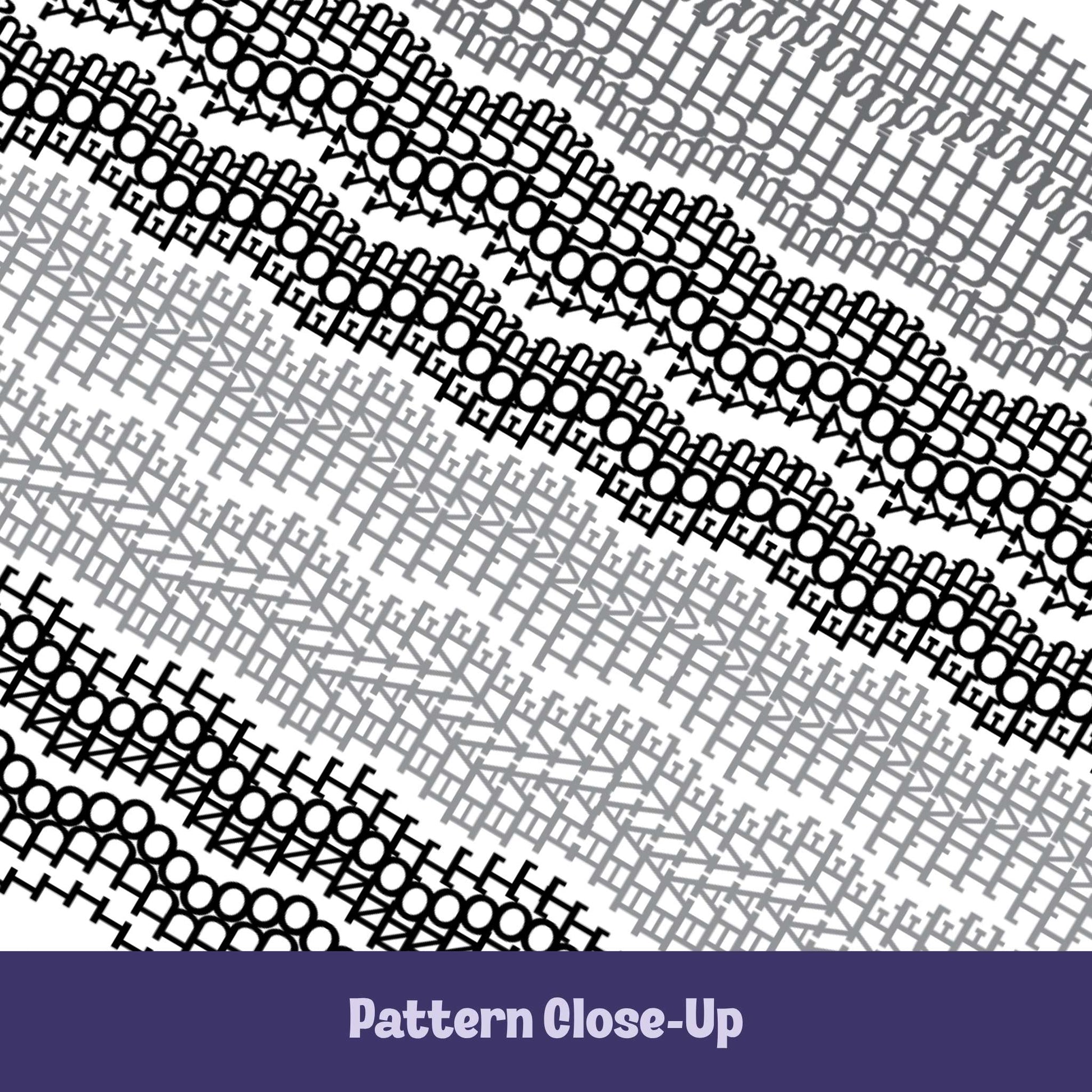 Close-up of gray and charcoal embroidery stitch pattern on hidden message mug showing alternating light and dark bands