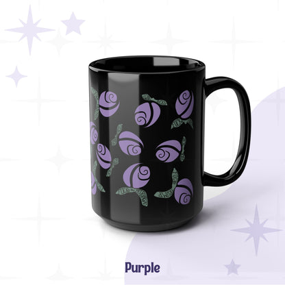Purple floral protest mug on black ceramic — lilac rosebuds with sage green hand-lettered leaves, angled hero view