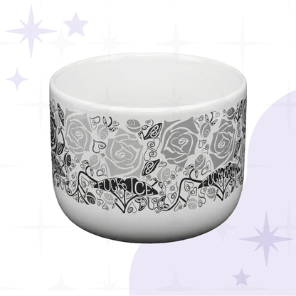 Hidden profanity latte mug front view showing full wrap rose pattern with Fuck ICE and Fuck Fascism hand-lettered protest banners, white ceramic on purple background