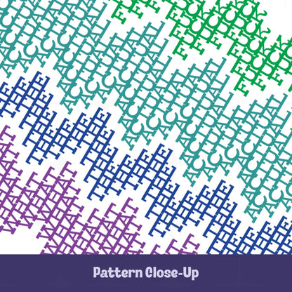 Close-up of hidden swear word mug pattern in purple, blue, teal, & green revealing repeating text WHAT THE ACTUAL FUCK in cross-stitch style letterforms