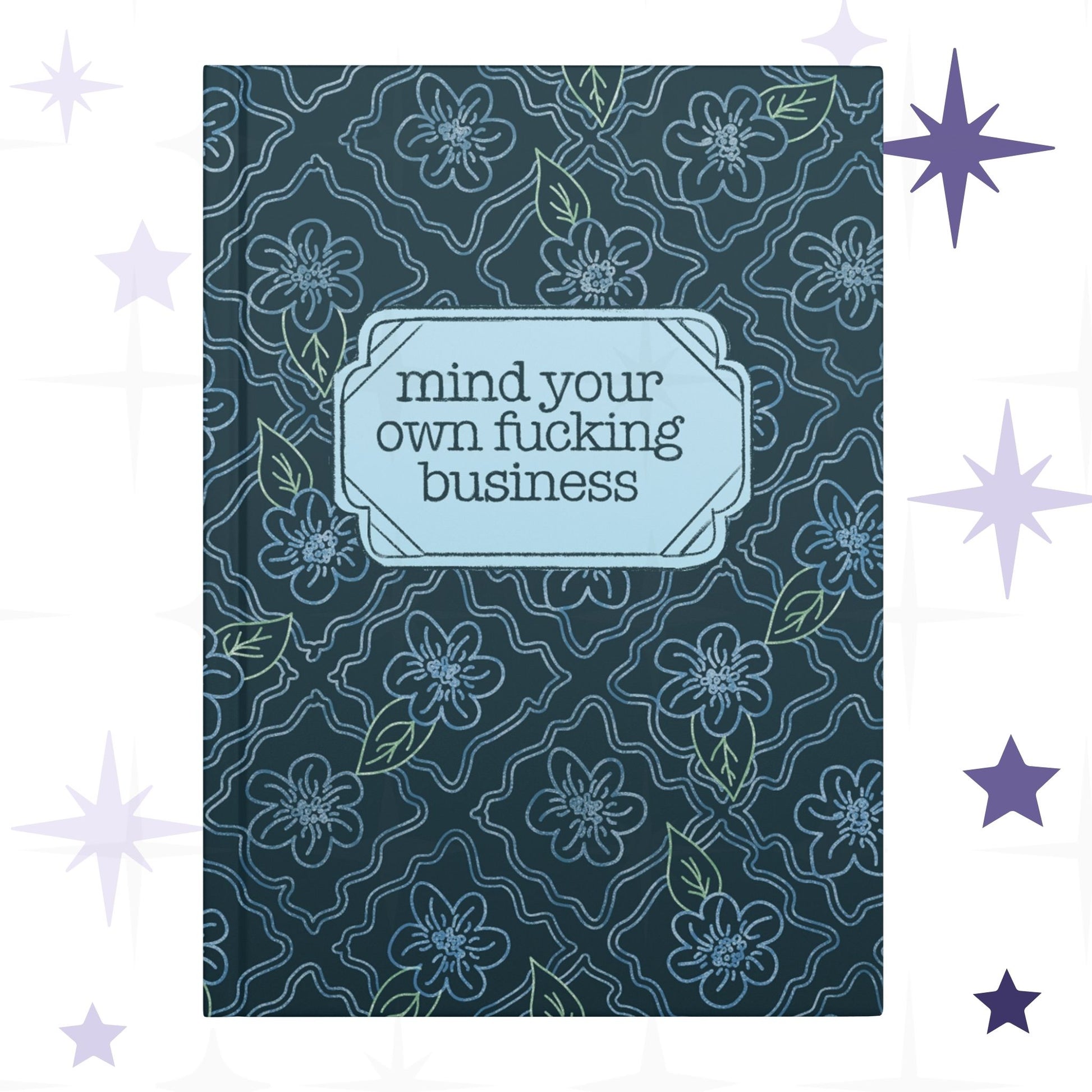 Profanity floral hardcover journal with teal botanical pattern and vintage label reading mind your own fucking business in retro serif type