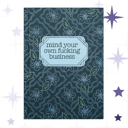 Profanity floral hardcover journal with teal botanical pattern and vintage label reading mind your own fucking business in retro serif type