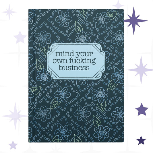 Profanity floral hardcover journal with teal botanical pattern and vintage label reading mind your own fucking business in retro serif type