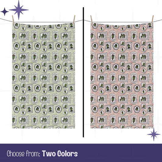 Retro illustrated olive tea towel in sage green and dusty rose colorways, showing all-over mid-century portrait pattern, hanging on clothesline