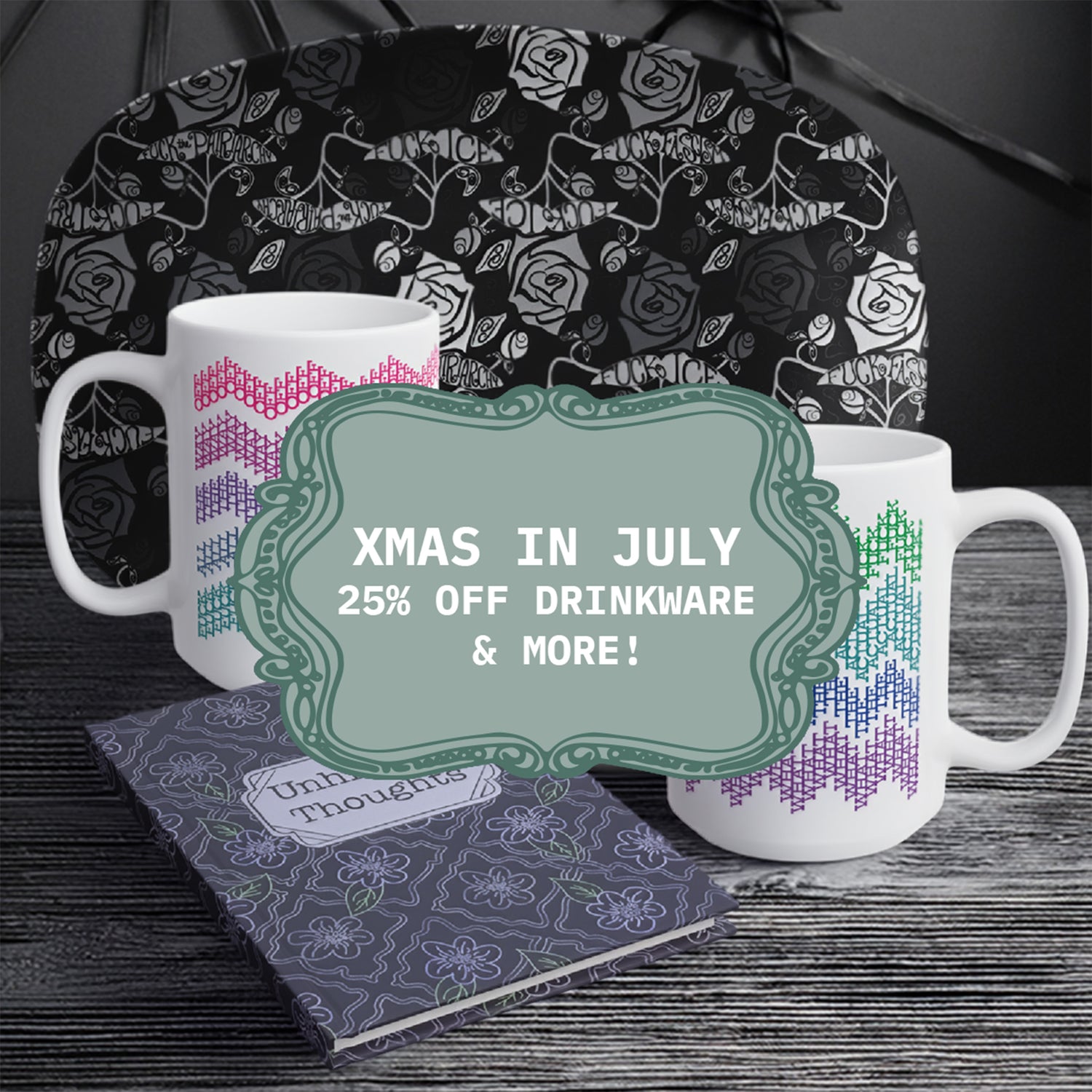 Rainbow chevron fair isle mugs, a black rose serving platter, and an Unhinged Thoughts floral journal on dark wood, with a green vintage frame badge reading Xmas in July 25% off drinkware and more.